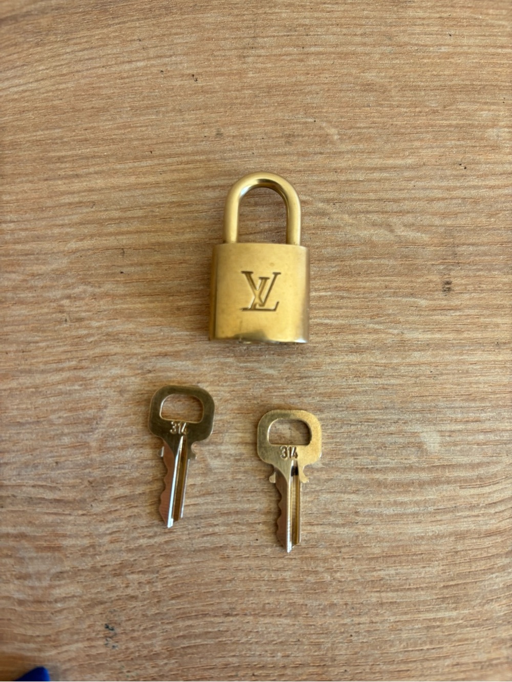 Authentic Louis Vuitton lock and key set